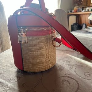 Cross body bucket purse oh wicker with red trim